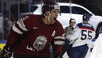 Lotyšský útočník Janis Sprukts se raduje poté, co otevřel skóre zápasu se Slovenskem. Lotyšský útočník Janis Sprukts se raduje poté, co otevřel skóre zápasu se Slovenskem.