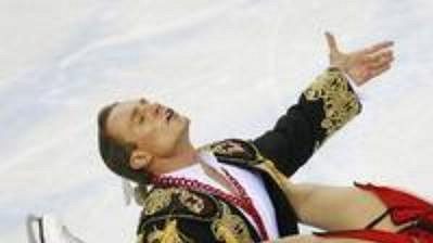 Olympijští vítězové v tancích na ledě Taťána Navková a Roman Kostomarov z Ruska při volné jízdě.