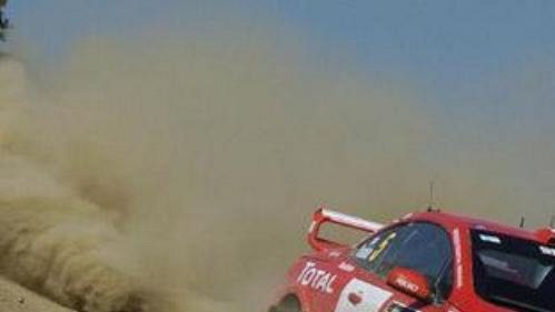 Marcus Gronhölm s peugeotem na trati Kyperské rallye.