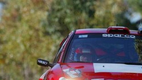 Finský pilot Grönhölm s Peugeotem 206 na trati Australské rallye.