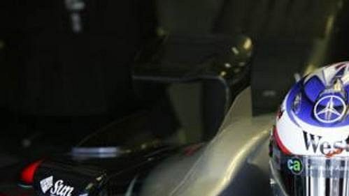 Kimi Räikkönen v boxech.