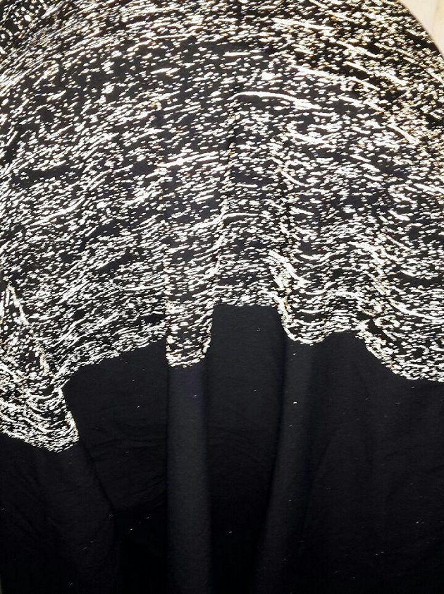 Pánská běžecká bunda Adidas Supernova Storm - reflexní prvky po focení s bleskem.