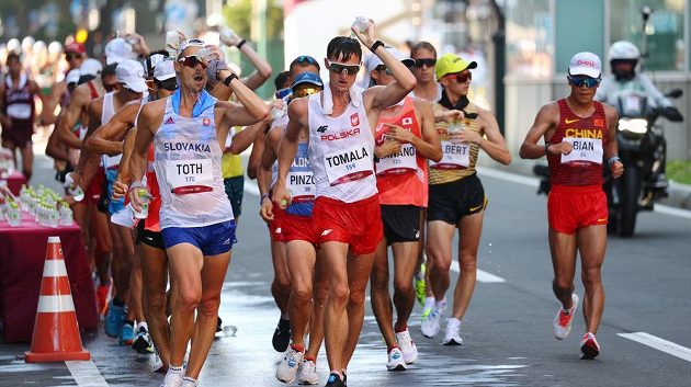 Athletics , Men's 50km WalkTokyo 2020 Olympics - Athletics - Men's 50km Walk - Sapporo Odori Park, Sapporo, Japan - August 6, 2021. Matej Toth of Slovakia and Dawid Tomala of Poland in action REUTERS/Kim Hong-Ji