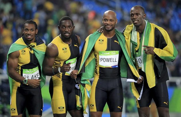 Zlatí jamajští sprinteři ve štafetě na 4x100 metrů: (Zleva) Yohan Blake, Nickel Ashmeade, Asafa Powell a Usain Bolt.