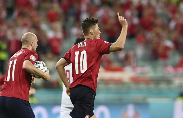 Czech joy.  Patrik Schick (right) celebrates his shot into the Danish net during the EURO quarterfinals.