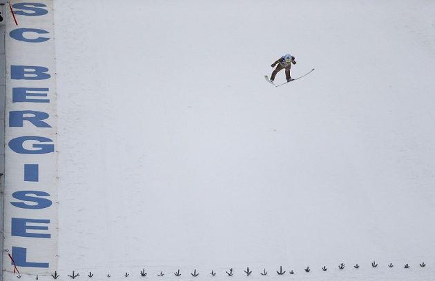 Polák Kamil Stoch během posledního závodu Turné čtyř můstků v Bischofshofenu.