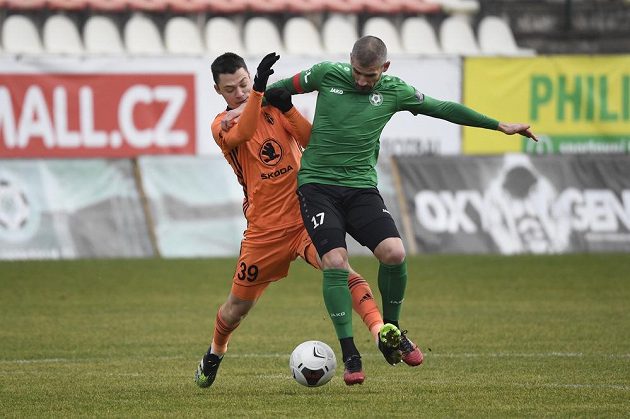 From left, Dominik Janošek from Mladá Boleslav and Jan Rezek from Příbram during the match of the highest competition.