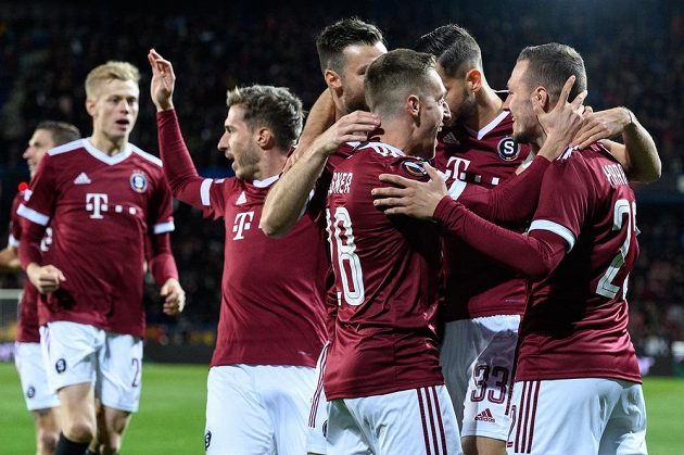 Sparta footballers celebrate a goal against Lyon in the European League.