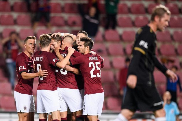 Sparta Prague footballers celebrate Lukáš Juliš's goal.