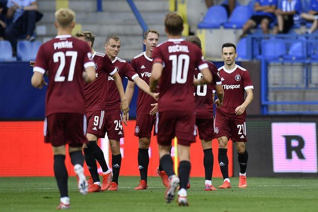 Sparta players are happy with the first goal, on the right its author Jakub Pešek.