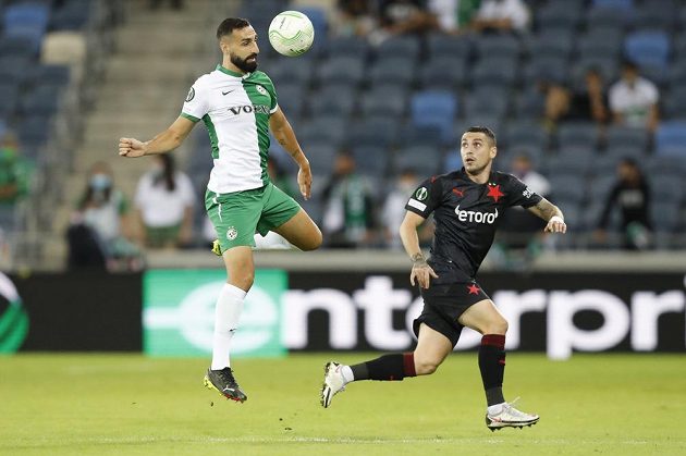 Footballer Maccabi Haifa Jose Rodriguez (left) and golfer Nicolae Stanciu in a Conference League match.