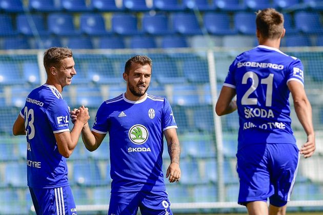 From left, Vojtěch Smrž from Boleslav, Tomáš Ladra from Boleslav and Milan Škoda from Boleslav celebrate a goal.