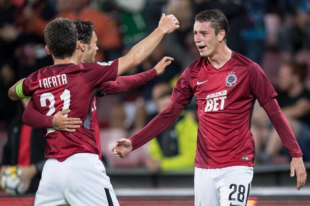 Fotbalisté Sparty Praha Václav Kadlec, David Lafata a Onfřej Zahustel oslavují gól na 3:0 během utkání 8.kola HET ligy s Teplicemi.