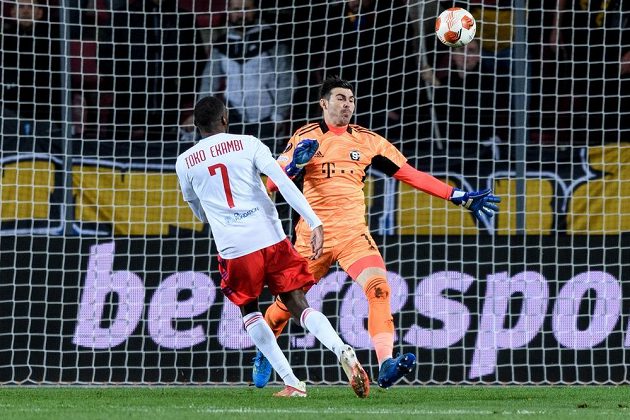 Karl Toko Ekambi from Lyon beats Sparta Prague goalkeeper Florina Nitu.