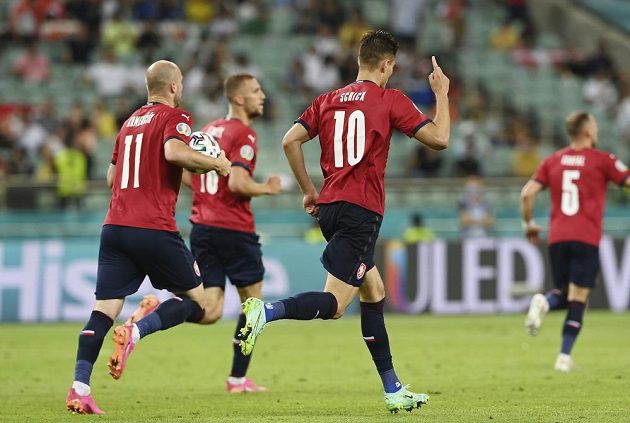 Czech joy.  Patrik Schick (right) celebrates his shot into the Danish net during the EURO quarterfinals.