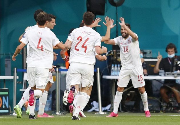 Spanish joy.  Jordi Alba celebrates a goal in the EURO quarterfinals after the Swiss Denis Zakaria sent the ball into his own net.