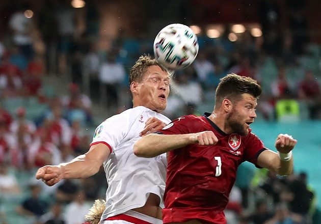 Czech defender Ondřej Čelůstka in an air battle with Dan Jannik Vestergaard during the EURO quarterfinals.