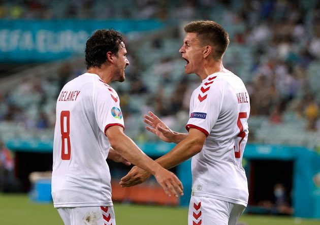 Danish footballers Thomas Delaney and Joakim Maehle celebrate the second goal in the Czech team's net in the EURO quarterfinals.