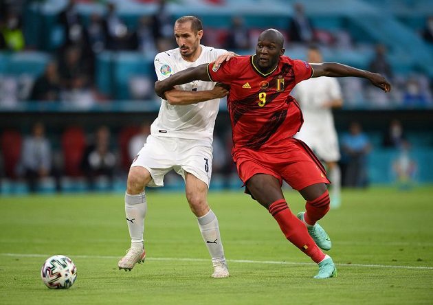 Belgian football striker Romelu Lukaku in action during the EURO quarterfinals with Italy.  Italian Giorgio Chiellini is fighting the gunner.