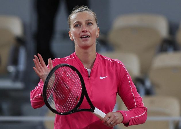 He is fighting.  Petra Kvitová celebrates advancing to the quarterfinals of the French Open.