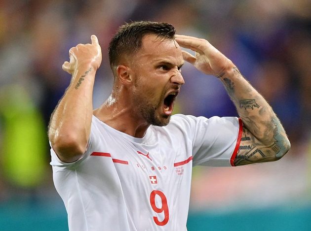 Swiss goal scorer Haris Seferovic rejoices.