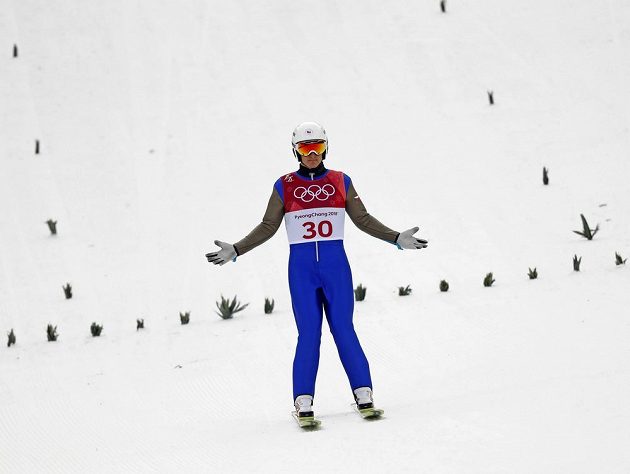 Český sdruženář Tomáš Portyk po skoku na středním můstku v olympijském závodě.