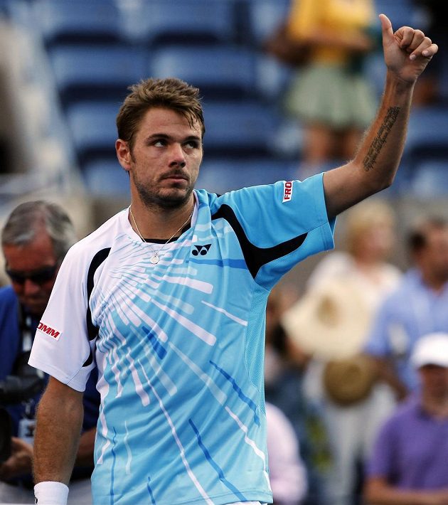 Švýcarský tenista Stanislas Wawrinka se raduje z postupu do druhého kola US Open.