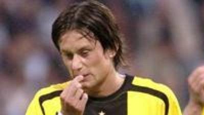 Tomáš Rosický (na archivním snímku vlevo) v dresu Dortmundu Tomáš Rosický (na archivním snímku vlevo) v dresu Dortmundu