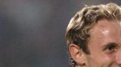 Fotbalista Olomouce Roman Hubník (vlevo) se raduje se spoluhráči. Fotbalista Olomouce Roman Hubník (vlevo) se raduje se spoluhráči.