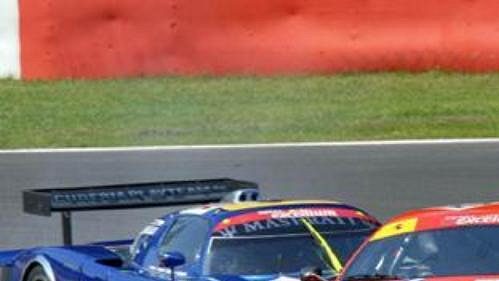 Vůz Ferrari 430 GT stáje Scuderia Ecosse na trati ve Spa Vůz Ferrari 430 GT stáje Scuderia Ecosse na trati ve Spa