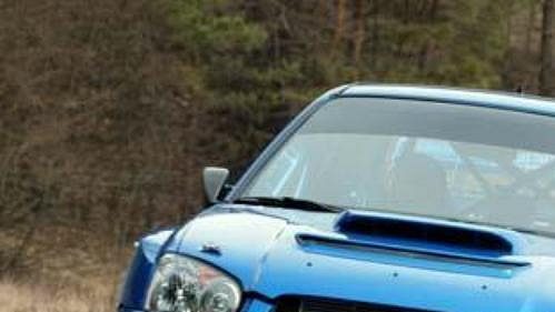 Roman Kresta se spolujezdcem Petrem Grossem při testech Subaru Impreza WRC S9. Roman Kresta se spolujezdcem Petrem Grossem při testech Subaru Impreza WRC S9.