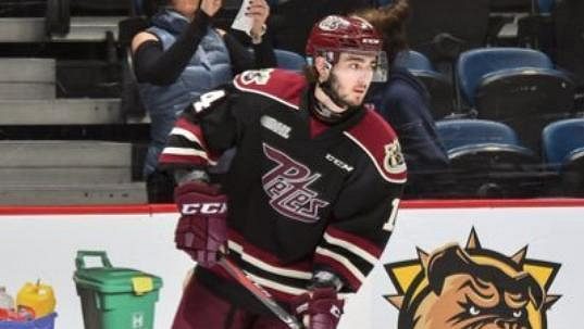 Liam Kirk v dresu Peterborough v OHL. Liam Kirk v dresu Peterborough v OHL.