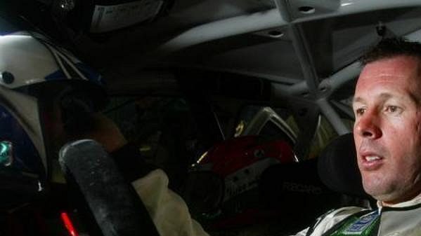 Skot Colin McRae ve voze Škoda Fabia WRC v servisní zóně Britské rallye 2005. Skot Colin McRae ve voze Škoda Fabia WRC v servisní zóně Britské rallye 2005.