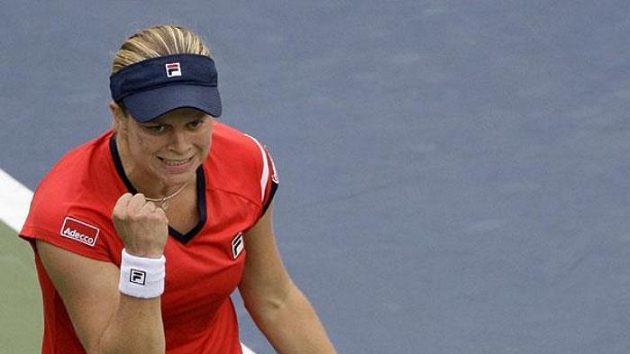 Belgická tenistka Kim Clijstersová oslavuje vítězství nad Venus Williamsovou. Belgická tenistka Kim Clijstersová oslavuje vítězství nad Venus Williamsovou.