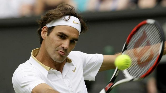 Švýcarský tenista Roger Federer během prvního kola Wimbledonu Švýcarský tenista Roger Federer během prvního kola Wimbledonu