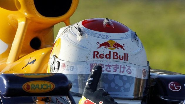 Sebastian Vettel se raduje z vítězství v GP Japonska. Sebastian Vettel se raduje z vítězství v GP Japonska.