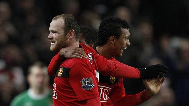 Wayne Rooney (vlevo) se raduje z jedné ze svých 21 letošních tref v dresu Manchesteru United. Wayne Rooney (vlevo) se raduje z jedné ze svých 21 letošních tref v dresu Manchesteru United.