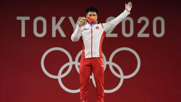 Soutěž vzpěračů ve váze do 61 kg vyhrál v Tokiu Číňan Li Fa-pin. Soutěž vzpěračů ve váze do 61 kg vyhrál v Tokiu Číňan Li Fa-pin.