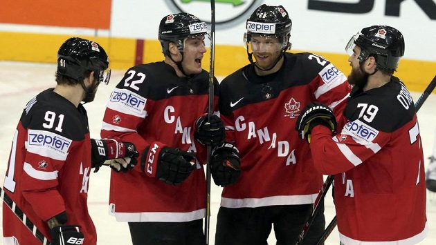 Kanadští hokejisté Tyson Barrie (druhý zleva), Tyler Seguin (vlevo), Ryan O'Reilly (vpravo) a Claude Giroux slaví gól proti rakousku na MS v Praze. Kanadští hokejisté Tyson Barrie (druhý zleva), Tyler Seguin (vlevo), Ryan O'Reilly (vpravo) a Claude Giroux slaví gól proti rakousku na MS v Praze.