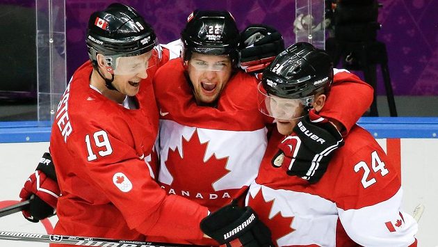 Útočník Kanady Jamie Benn se raduje z gólu proti USA se spoluhráči Jayem Bouwmeesterem (vlevo) a Corey Perrym v semifinále olympiády. Útočník Kanady Jamie Benn se raduje z gólu proti USA se spoluhráči Jayem Bouwmeesterem (vlevo) a Corey Perrym v semifinále olympiády.