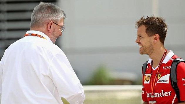 Ross Brawn a Seabstian Vettel. Ross Brawn a Seabstian Vettel.