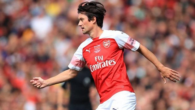 Tomáš Rosický v dresu Arsenalu během zápasu legend s Realem Madrid. Tomáš Rosický v dresu Arsenalu během zápasu legend s Realem Madrid.