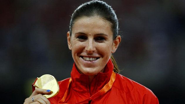 Zuzana Hejnová se zlatem za triumf na 400 m překážek při MS v Pekingu Zuzana Hejnová se zlatem za triumf na 400 m překážek při MS v Pekingu