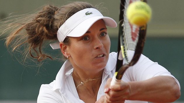 Česká tenistka Petra Cetkovská v utkání proti Italce Robertě Vinciové. Česká tenistka Petra Cetkovská v utkání proti Italce Robertě Vinciové.