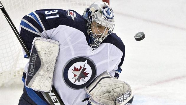 Ondřej Pavelec v dresu Winnipegu Jets. Ondřej Pavelec v dresu Winnipegu Jets.