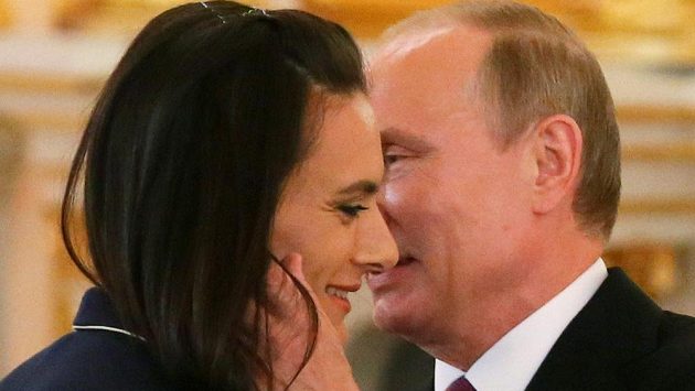 Tyčkařka Jelena Isinbajevová pří setkání s ruským prezidentem Vladimirem Putinem v Kremlu. Ilustrační snímek. Tyčkařka Jelena Isinbajevová pří setkání s ruským prezidentem Vladimirem Putinem v Kremlu. Ilustrační snímek.