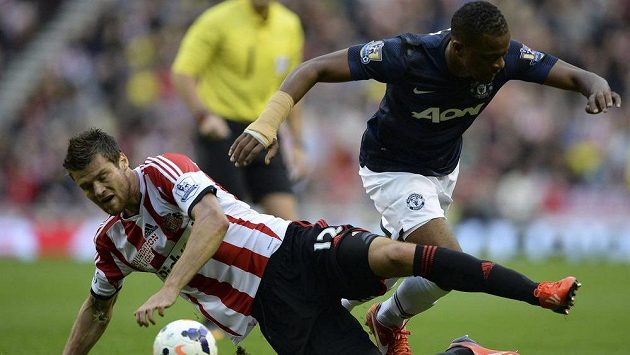 Patric Evra (vpravo) v dresu Manchesteru United. Patric Evra (vpravo) v dresu Manchesteru United.