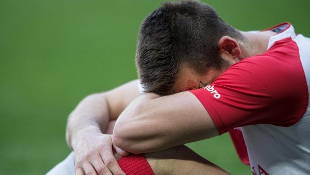 Obránce Slavie Praha Michal Lüftner bezprostředně po vlastním gólu. Obránce Slavie Praha Michal Lüftner bezprostředně po vlastním gólu.