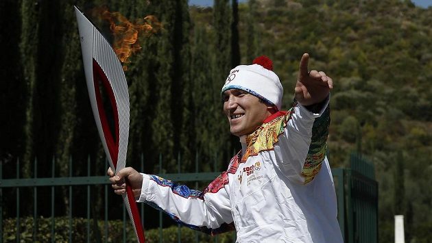 Alexandr Ovečkin s olympijskou pochodní. Alexandr Ovečkin s olympijskou pochodní.