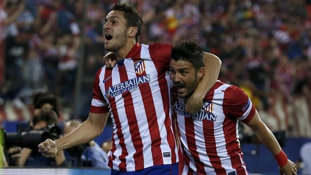 Úspěšný střelec Atlétika Madrid Koke a jeho spoluhráč David Villa (vpravo) se radují z vedoucího gólu v odvetě čtvrtfinále Ligy mistrů proti Barceloně. Úspěšný střelec Atlétika Madrid Koke a jeho spoluhráč David Villa (vpravo) se radují z vedoucího gólu v odvetě čtvrtfinále Ligy mistrů proti Barceloně.